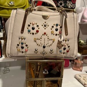 Coach Cream Satchel with Floral Cutout Design